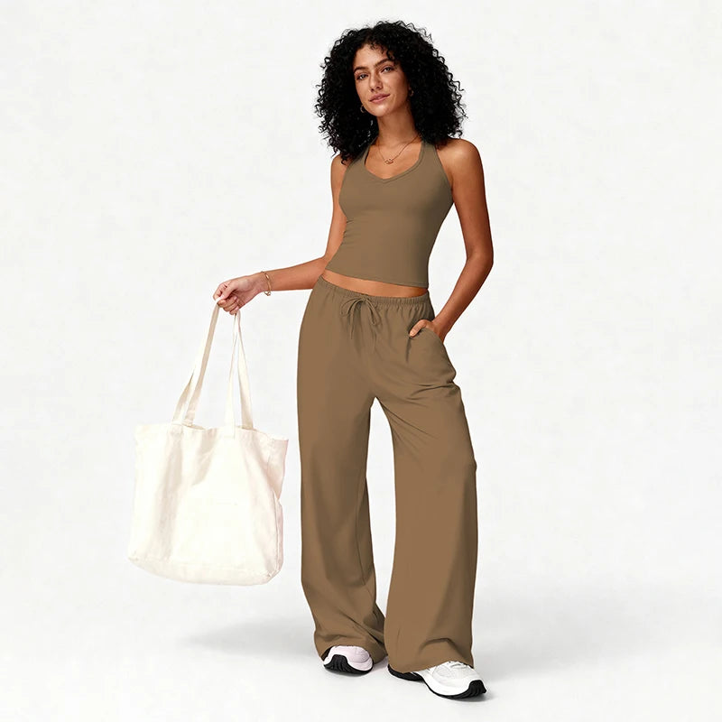 2-Piece Elegant Solid Color Women’s Fitness Sports Set | Quick-Dry Loose-Fit Yoga & Workout Suit