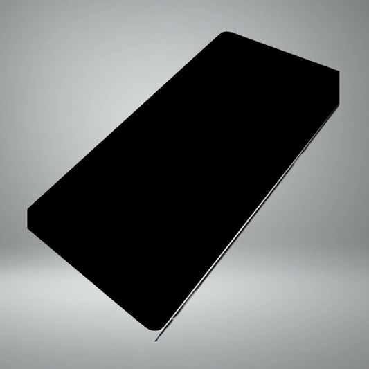 A black rectangular mousepad shown at an angle on a metallic silver gradient background.