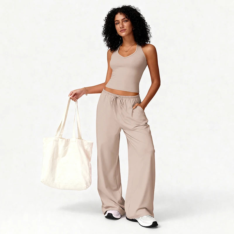 2-Piece Elegant Solid Color Women’s Fitness Sports Set | Quick-Dry Loose-Fit Yoga & Workout Suit