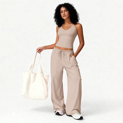 2-Piece Elegant Solid Color Women’s Fitness Sports Set | Quick-Dry Loose-Fit Workout Suit