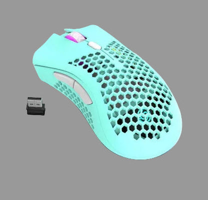 Blue gaming mouse with honeycomb design on a keyboard, featuring RGB lighting.